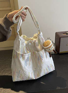 休闲大包包女夏2026新款时尚流行通勤单肩包大容量帆布斜挎托特包