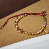 旭平波光粼粼铜钱福牌新中式 金色红绳抽拉手链