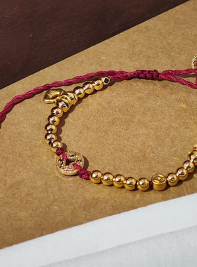 旭平波光粼粼铜钱福牌新中式金色红绳抽拉手链