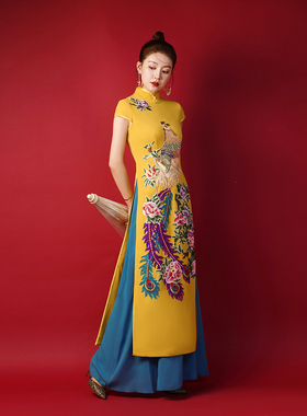 中国风式旗袍重工刺绣晚礼服黄色模特走秀团体演出修身古筝艺考夏