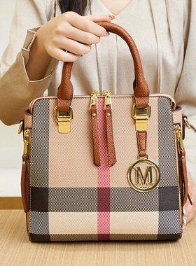 香港品牌真皮女包2025新款时尚大容量手提包女士单肩斜挎水桶包包