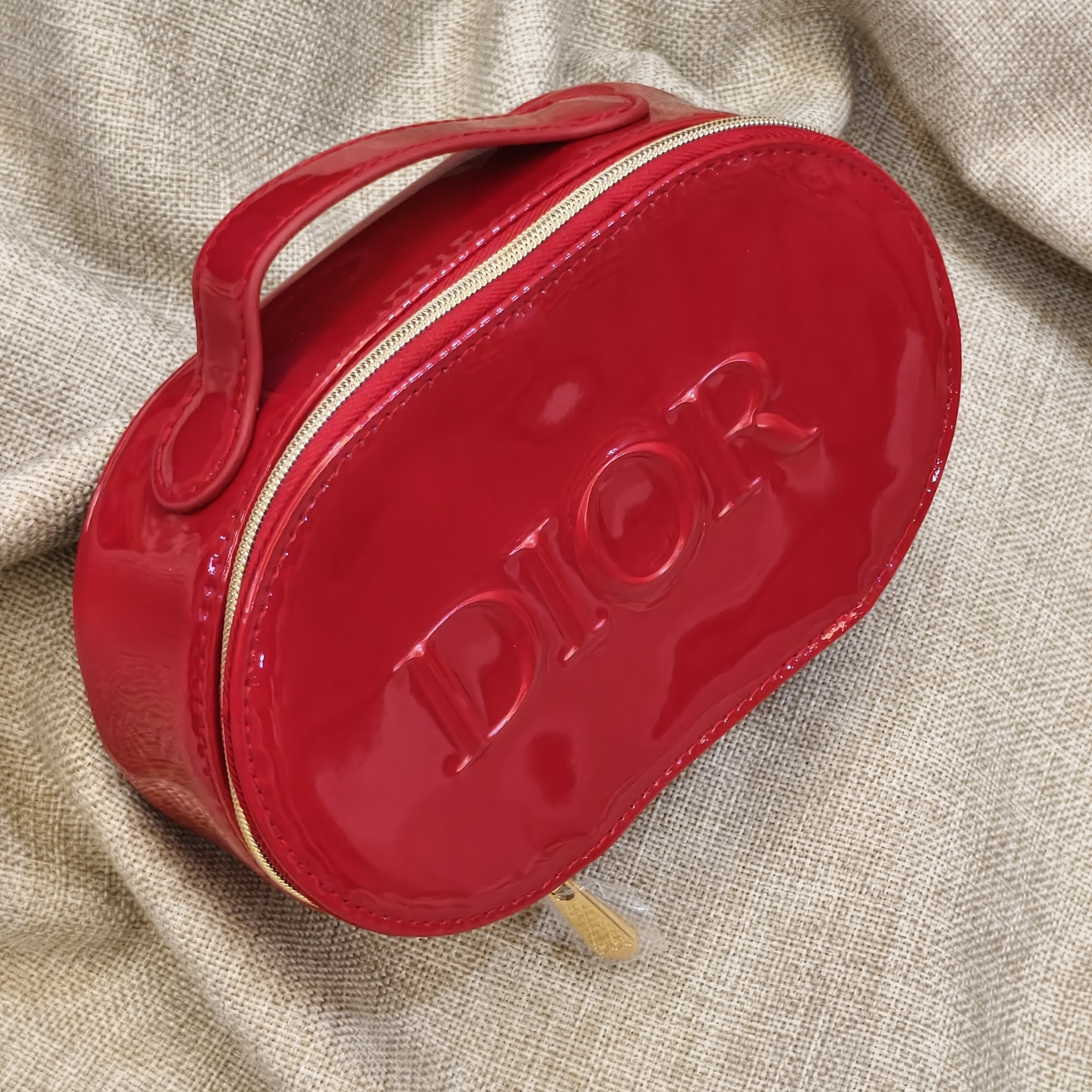 日本迪奥红色漆皮化妆包 专柜新品便携手提包时尚亮面吸睛收纳包