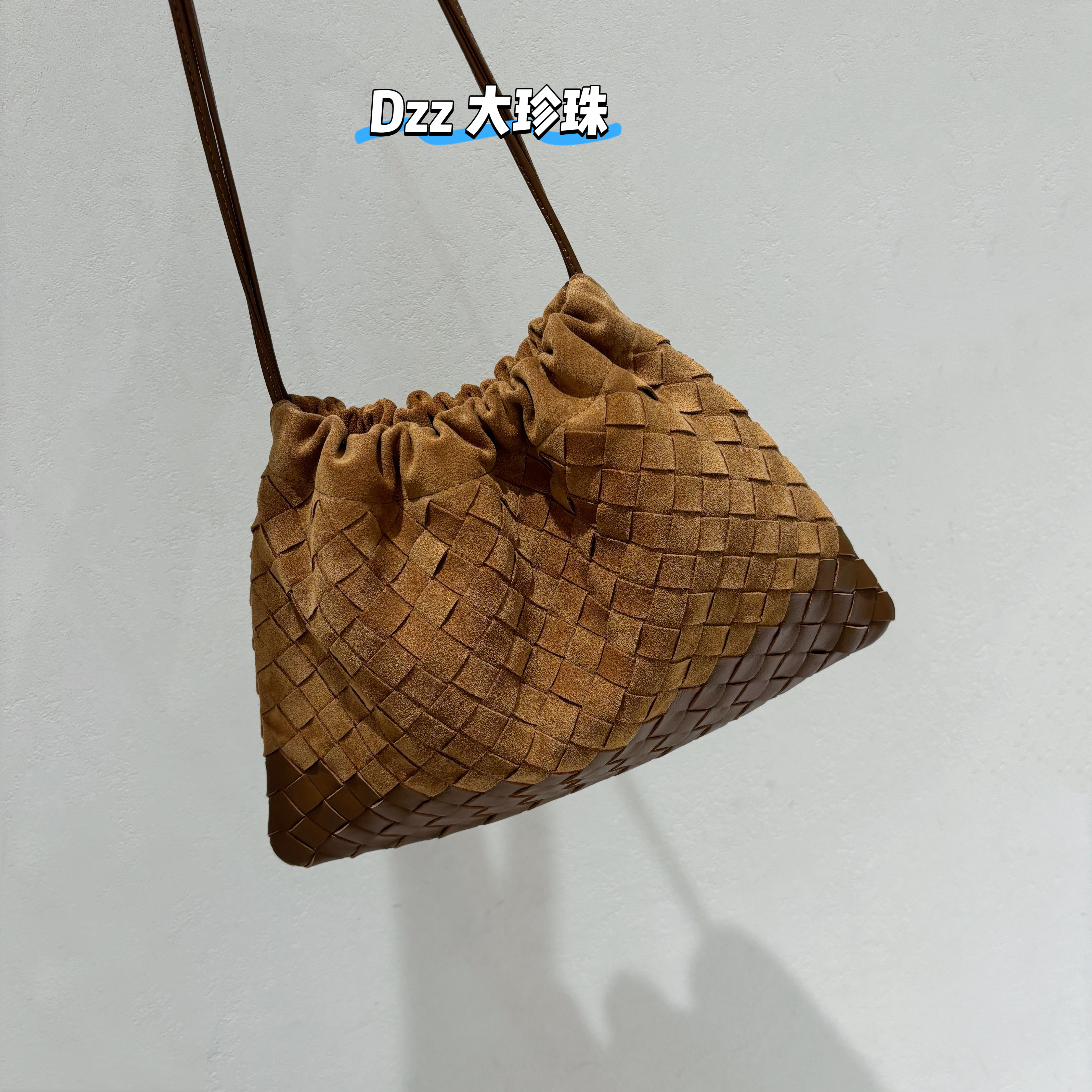 手工编织福袋包2026新款磨砂牛皮真皮抽绳单肩包斜挎包dustbag