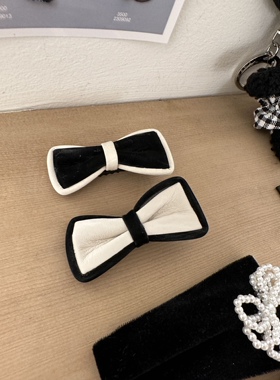 391413韩国东大门Reina简约黑白蝴蝶结精致秋冬款鸭嘴夹发夹