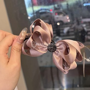 572403韩国东大门Baket新款对称蝴蝶结砂糖钻香蕉夹发夹