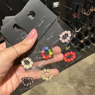 382317韩国东大门nyunyu彩色串珠小花弹力绳戒指