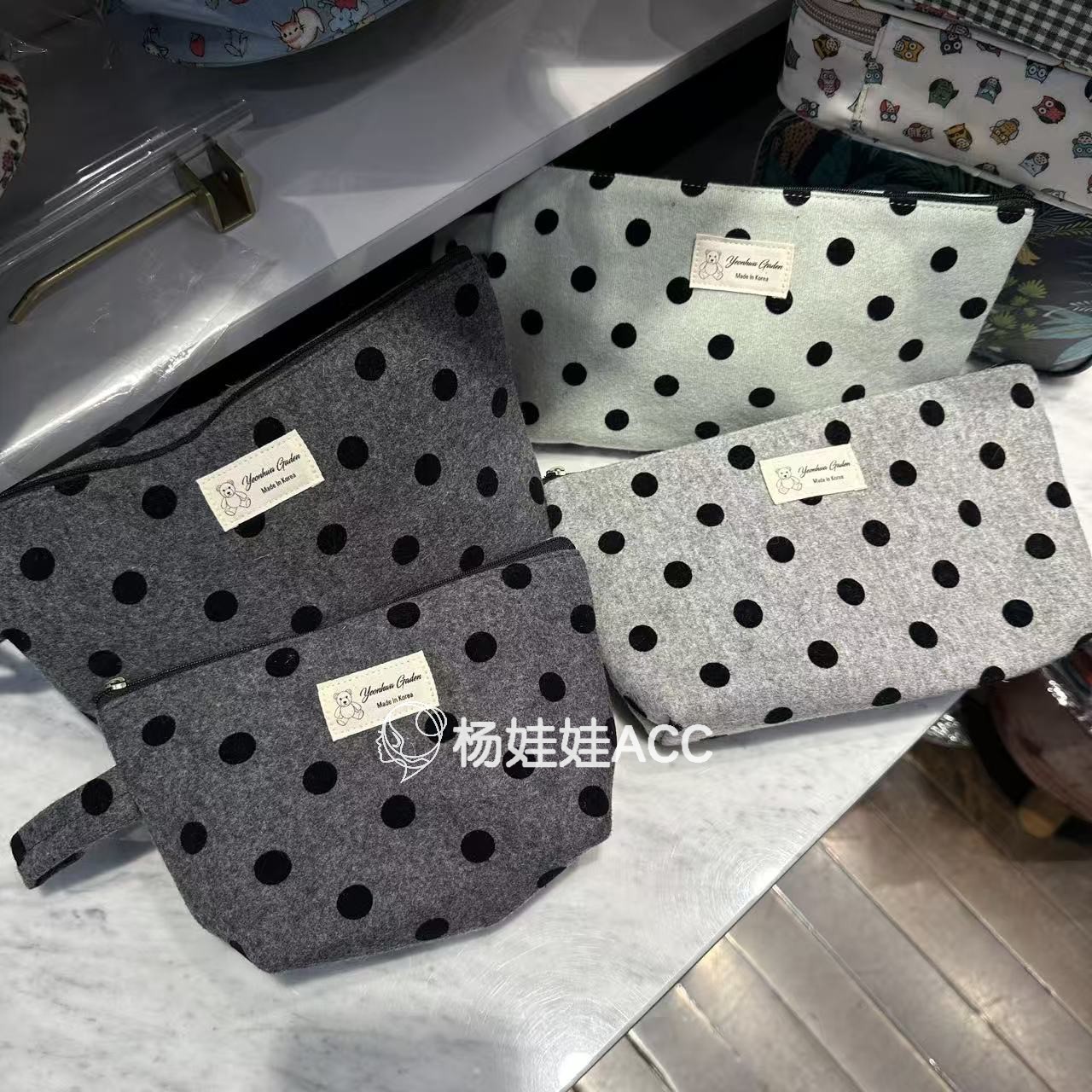 591316韩国东大门wing羊毛混纺波点时尚复古气质手拿包化妆包