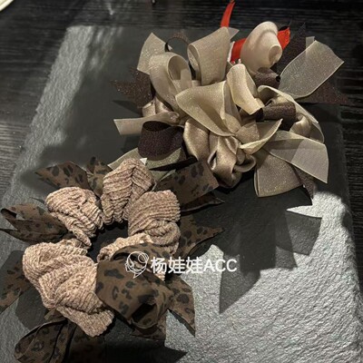 610704韩国东大门Trois de LEI新款高级感毛线豹纹蝴蝶结发圈