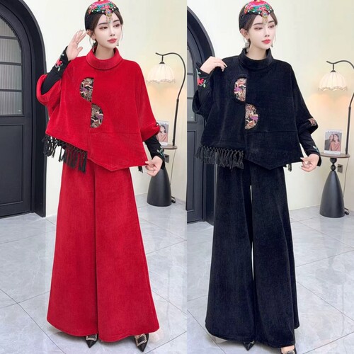 春秋新款刺绣民族风宽松遮肉气质套头大码上衣蝙蝠袖不规则上衣