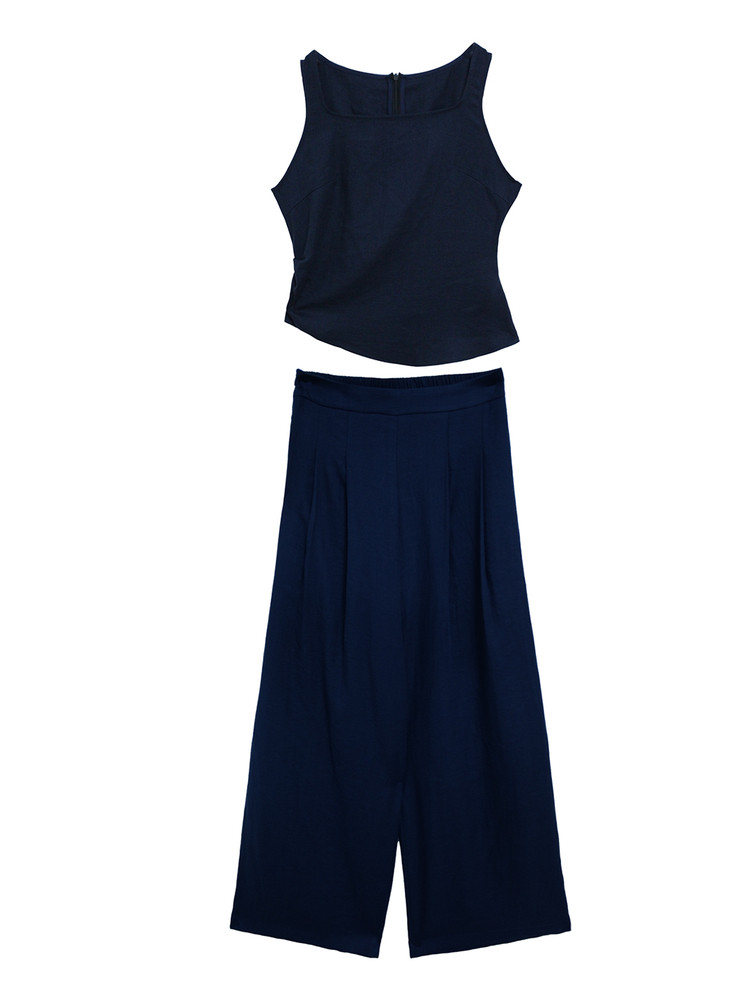 Dark navy sleeveless top and wide-leg pants laid flat