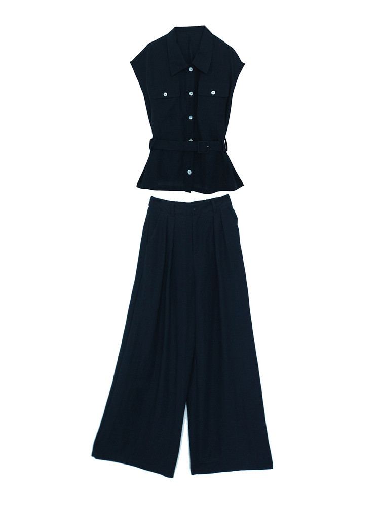 Black sleeveless belted top with wide-leg matching pants laid flat