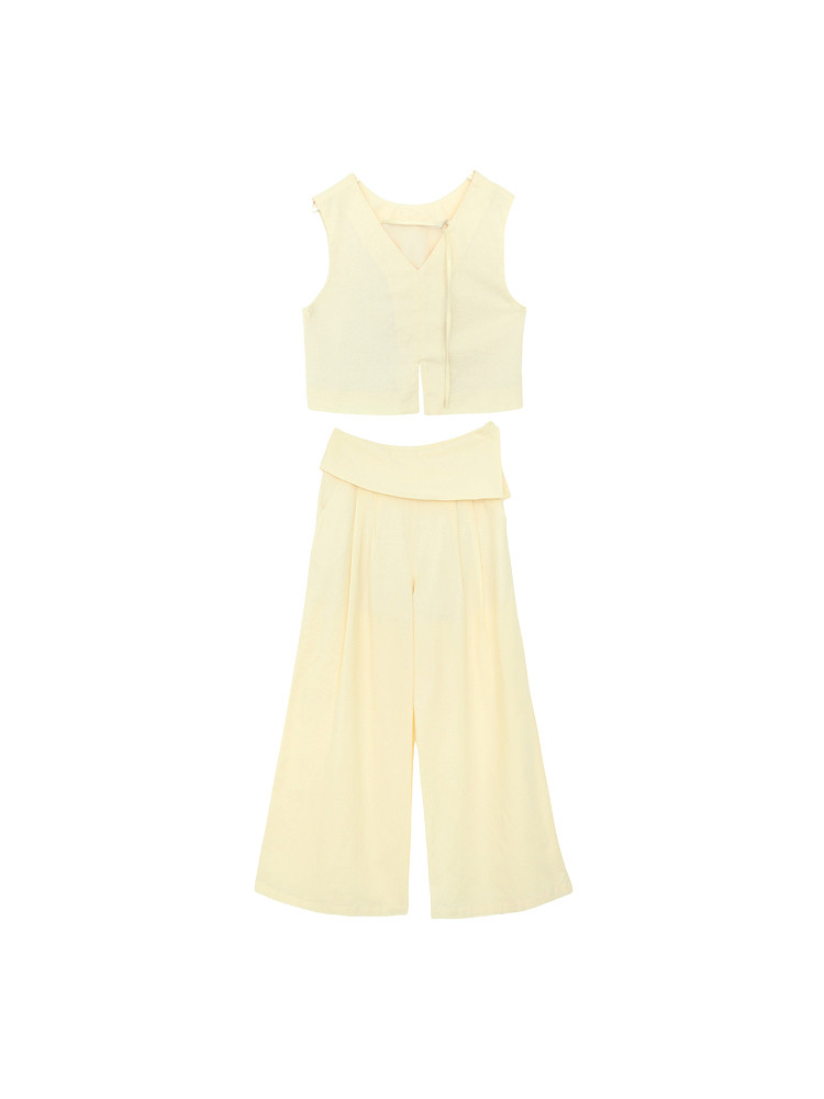 Pale yellow sleeveless top and wide-leg pants set on a white background
