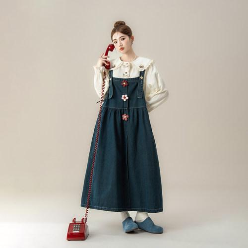蓝色甜美学院风花朵牛仔背带裙女