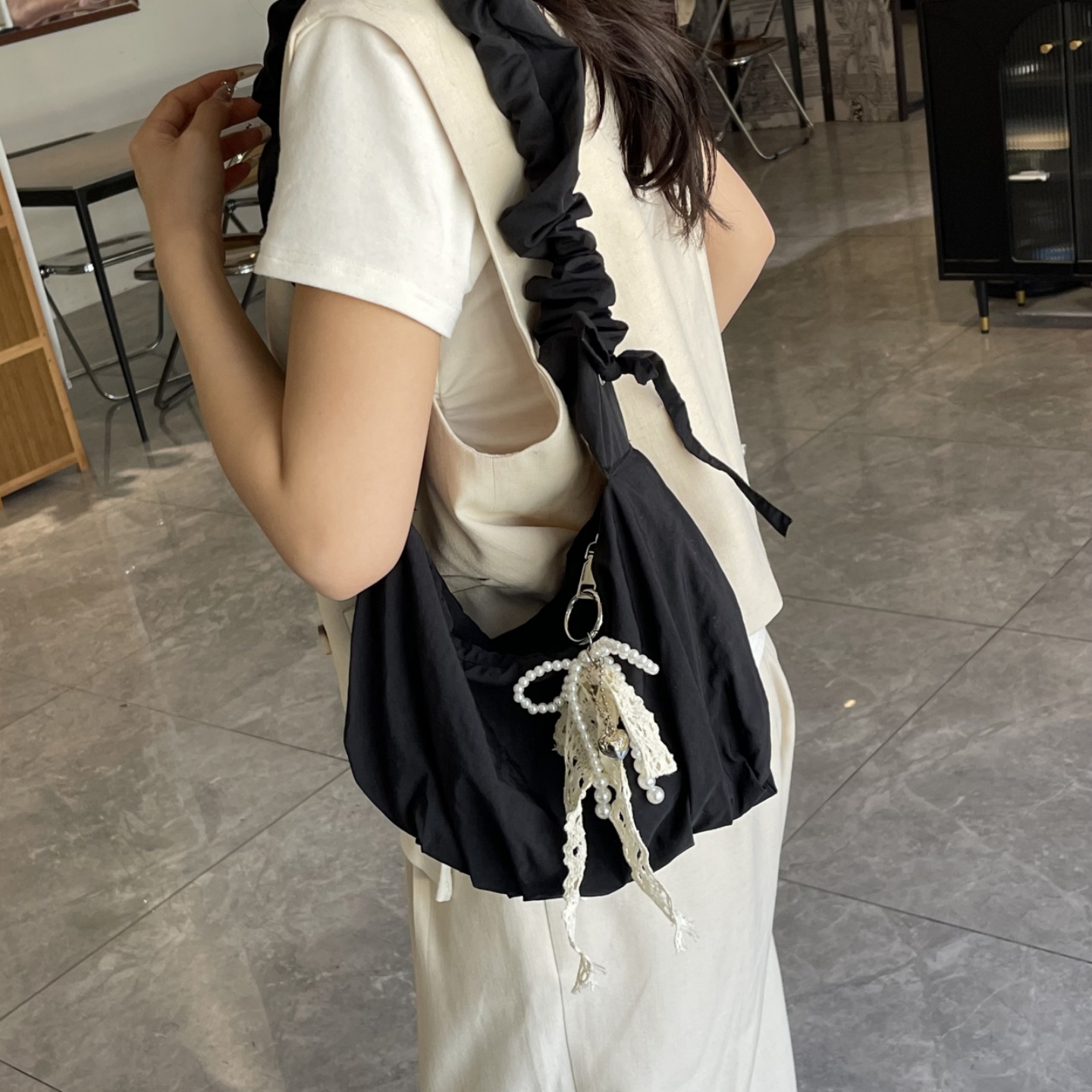 帆布包女夏天百搭2025新款大容量小众单肩斜挎包高级感褶皱饺子包