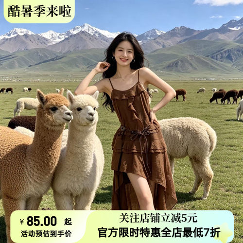 新疆旅游氛围感吊带连衣裙女民族风度假风荷叶边不规则长裙