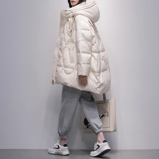 杏色羽绒服女中长款2025冬季新款韩版连帽宽松显瘦加厚白鹅绒外套
