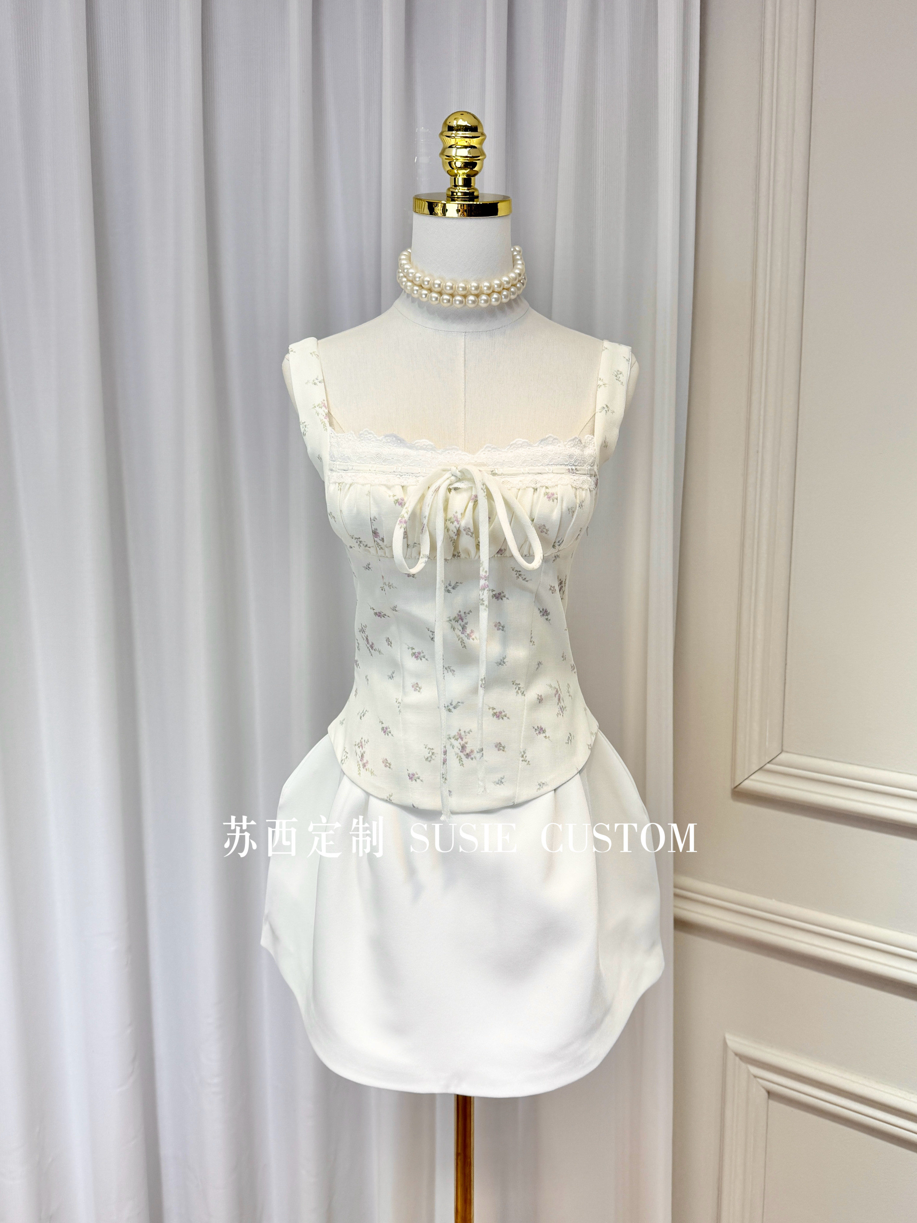 法式设计款甜美复古碎花蕾丝边绑带吊带上衣收腰花苞半身裙裤套装