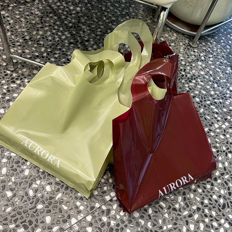 透明衣服手提袋时尚外出定制印刷logo服装包装袋便携打包带塑料袋