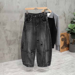 设计感黑色拼接破洞洗水弯刀裤牛仔裤男女嘻哈街舞高街宽松阔腿裤