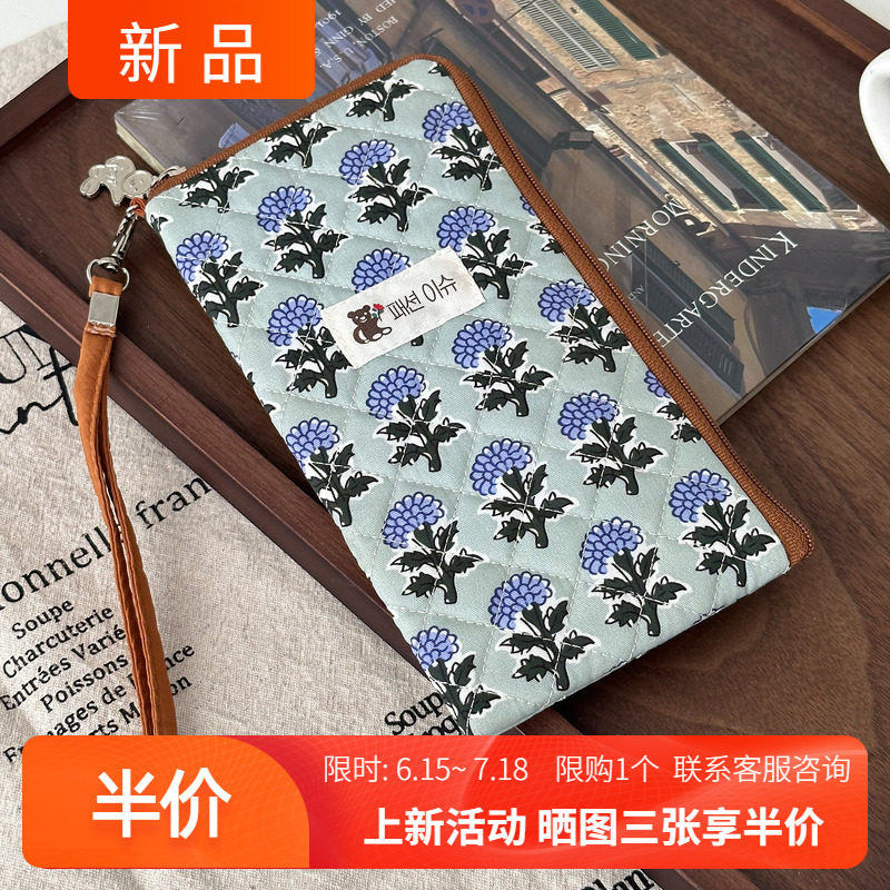 7寸菱格拉链挂脖夹棉手机包