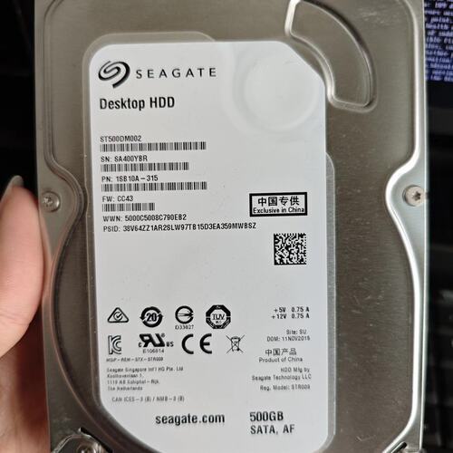 议价希捷500GB机械硬盘，型号ST500DM002-1SB10