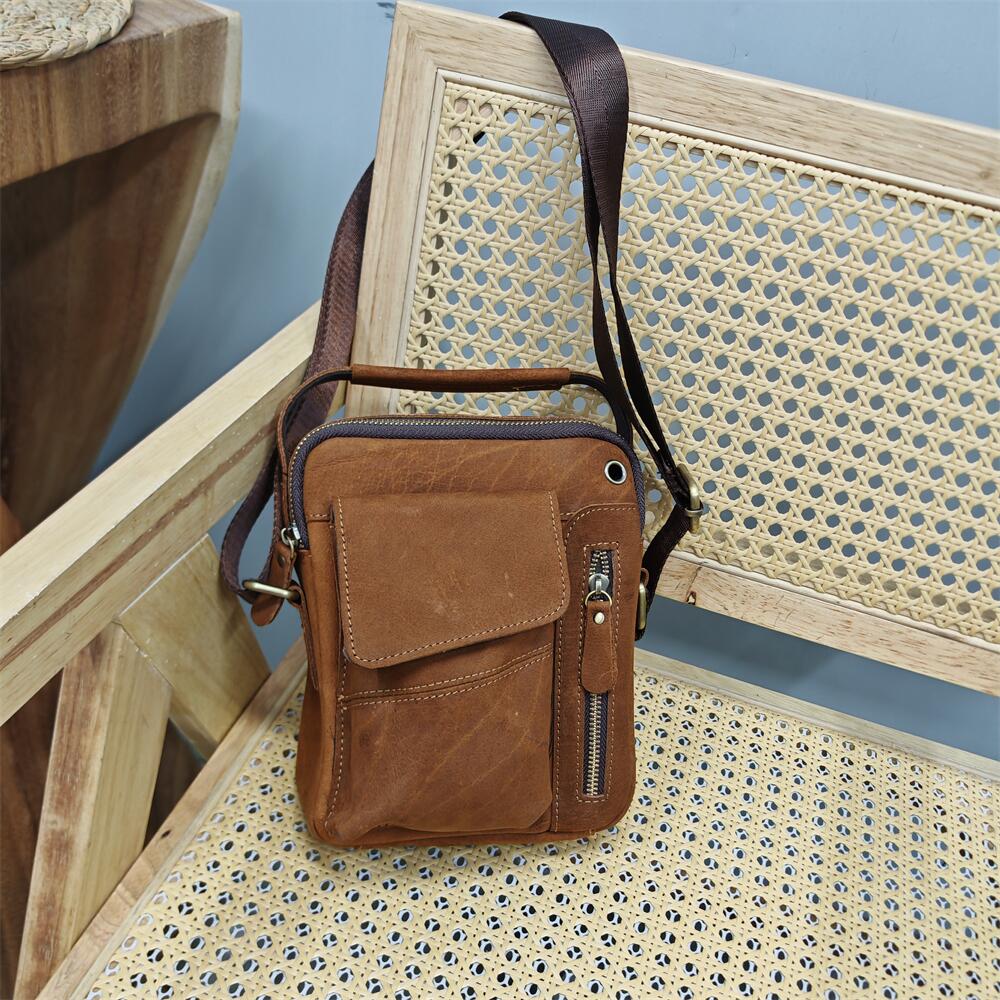 尾货清货品牌真皮斜挎男士日字包