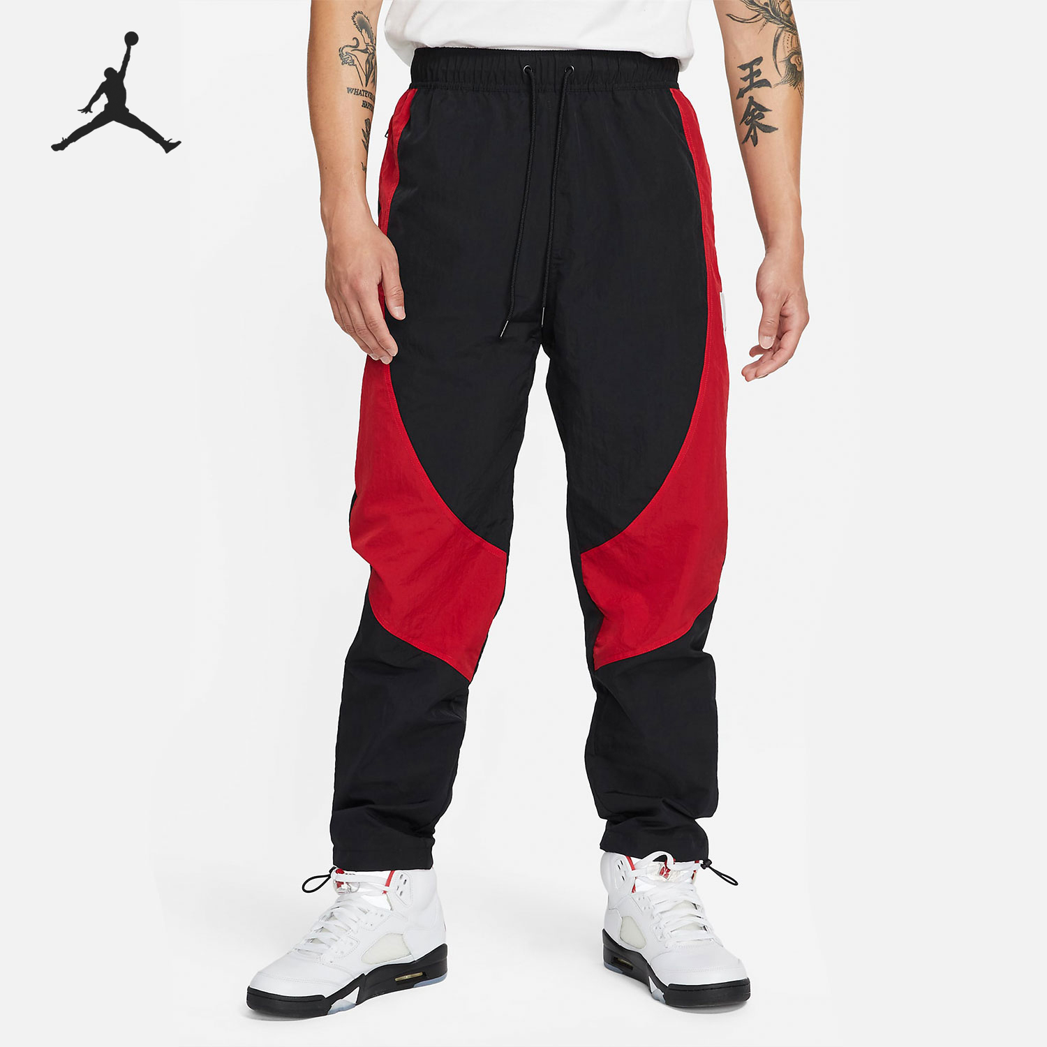 耐克男士拼接运动束脚跑步长裤