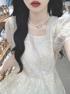 法式初恋杏色刺绣连衣裙女夏高级感气质收腰泡泡袖仙女温柔风长裙