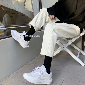 转化8%现货现货！2021春夏破洞牛仔九分裤男女中性修身裤NB160P55图片