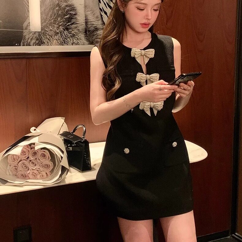 富家千金小香风蝴蝶结无袖连衣裙夏季新款设计感小众收腰显瘦短裙