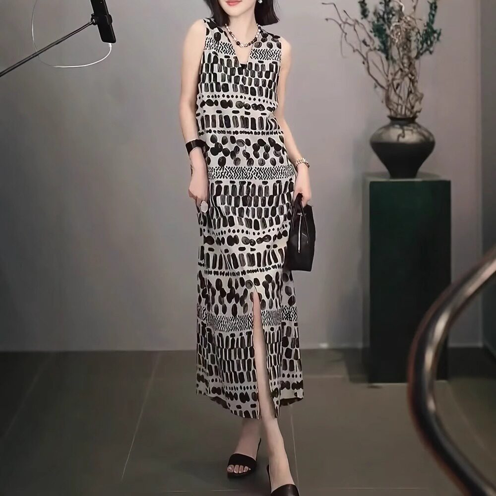 胖mm气质背心印花连衣裙女夏季设计感宽松显瘦大码冷淡系独特别致