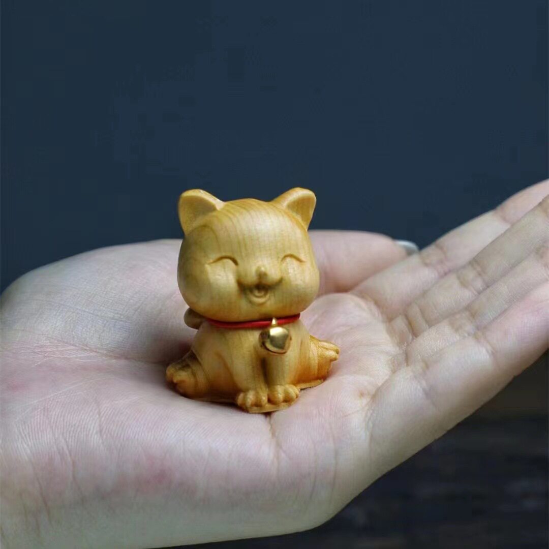 网红崖柏木雕小动物猫咪手把件