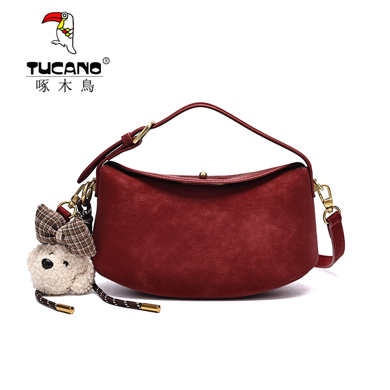 啄木鸟女包2026新款牛皮纯色防盗单肩斜挎包曼哈顿女包饺子包红色