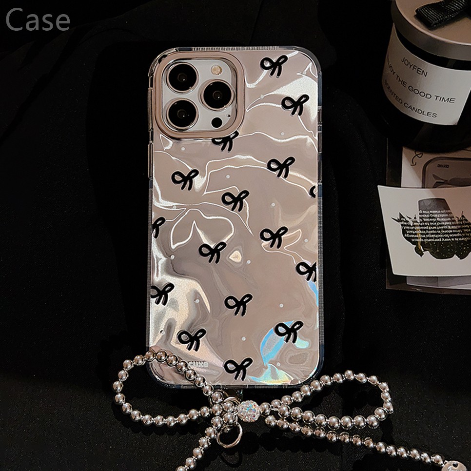 甜酷ins满屏黑色蝴蝶结适用苹果14手机壳iPhone15ProMax新款16pro防摔12女款15蝴蝶结挂件水波纹14pro保护套