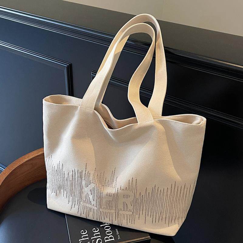 简约大容量托特包2025新款托特包韩版百搭帆布包上课单肩包手提包,箱包皮具/热销女包/男包,托特包,淘宝优惠券,粉丝福利购,淘宝优惠卷