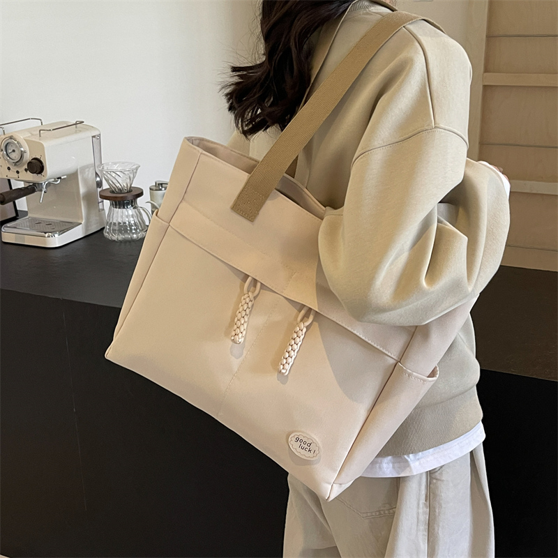 大容量帆布包上班通勤女士包包托特包2025春新款学生慵懒风单肩包