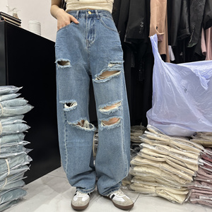 美式高街蓝色破洞弯刀裤女2024春宽松显瘦破洞裤阔腿镰刀裤微垮裤