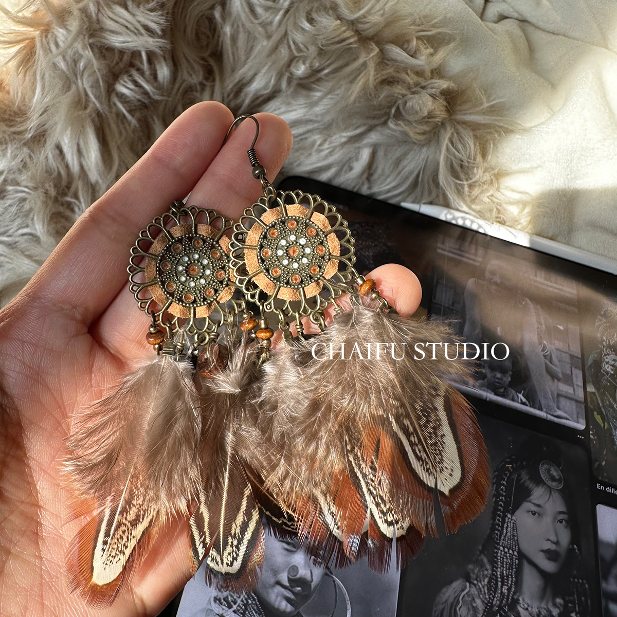 柴夫工作室/E223 复古部落风羽毛神秘古老图腾木珠耳钩耳环属于什么档次？