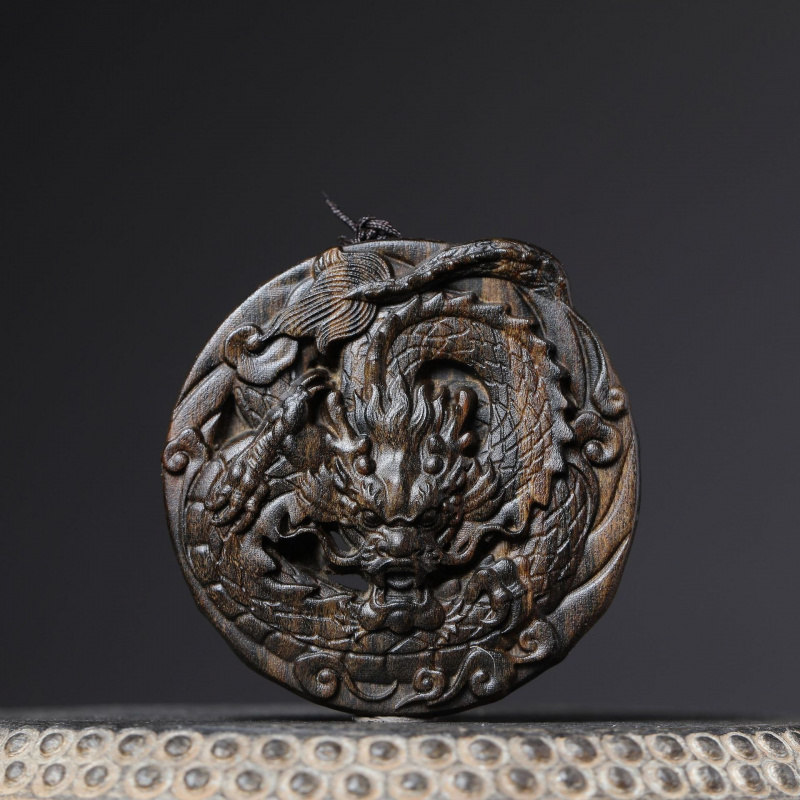 印尼达拉干沉香木雕镂空祥云龙牌