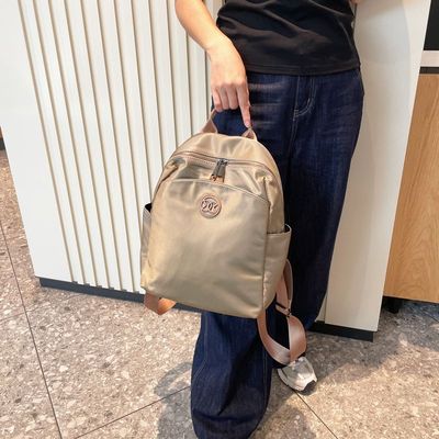 高级轻便双肩包女2025新款时尚休闲牛津布旅行包外出女士背包防水