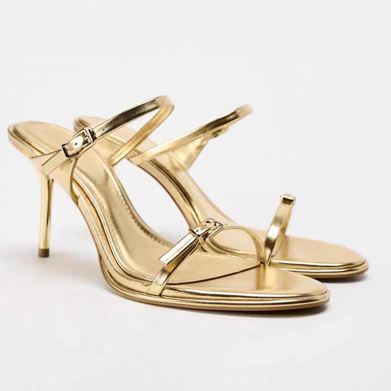 西班牙2024秋季新品小众一字带中空鞋金色带扣金属时尚细高跟凉鞋