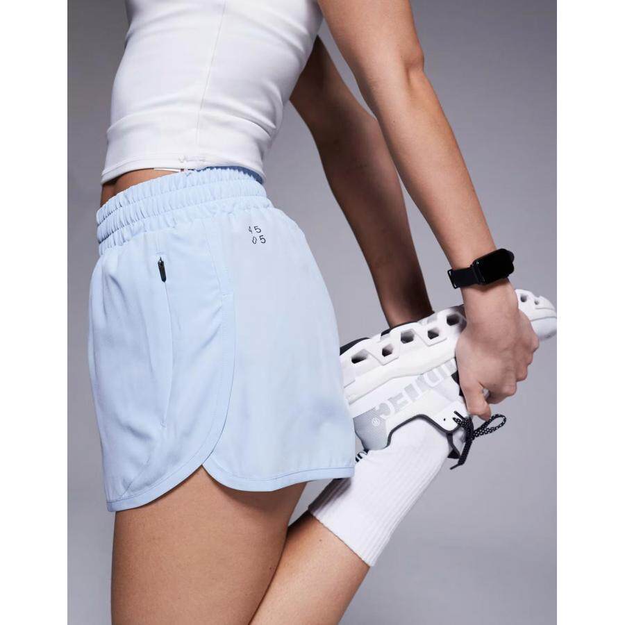 女子蓝色拉链口袋运动短裤英国正品代购2026年春健身训练休闲裤