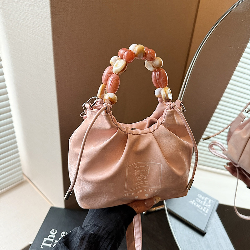 时尚简约休闲手提包2025冬季新款珍珠斜挎包包女韩版小众斜挎包