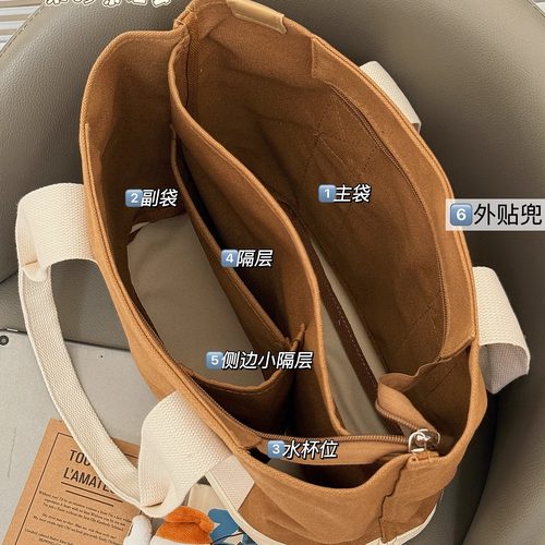 大容量单肩包女简约休闲托特包学生轻便通勤上课帆布包手提补习袋