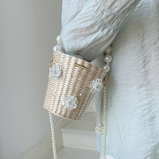 米娜 圆桶包 ins珍珠蝴蝶结草编包迷你手提小包包小众口红包女夏季