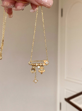 S925银拉丝鸢尾花黄水晶别针项链