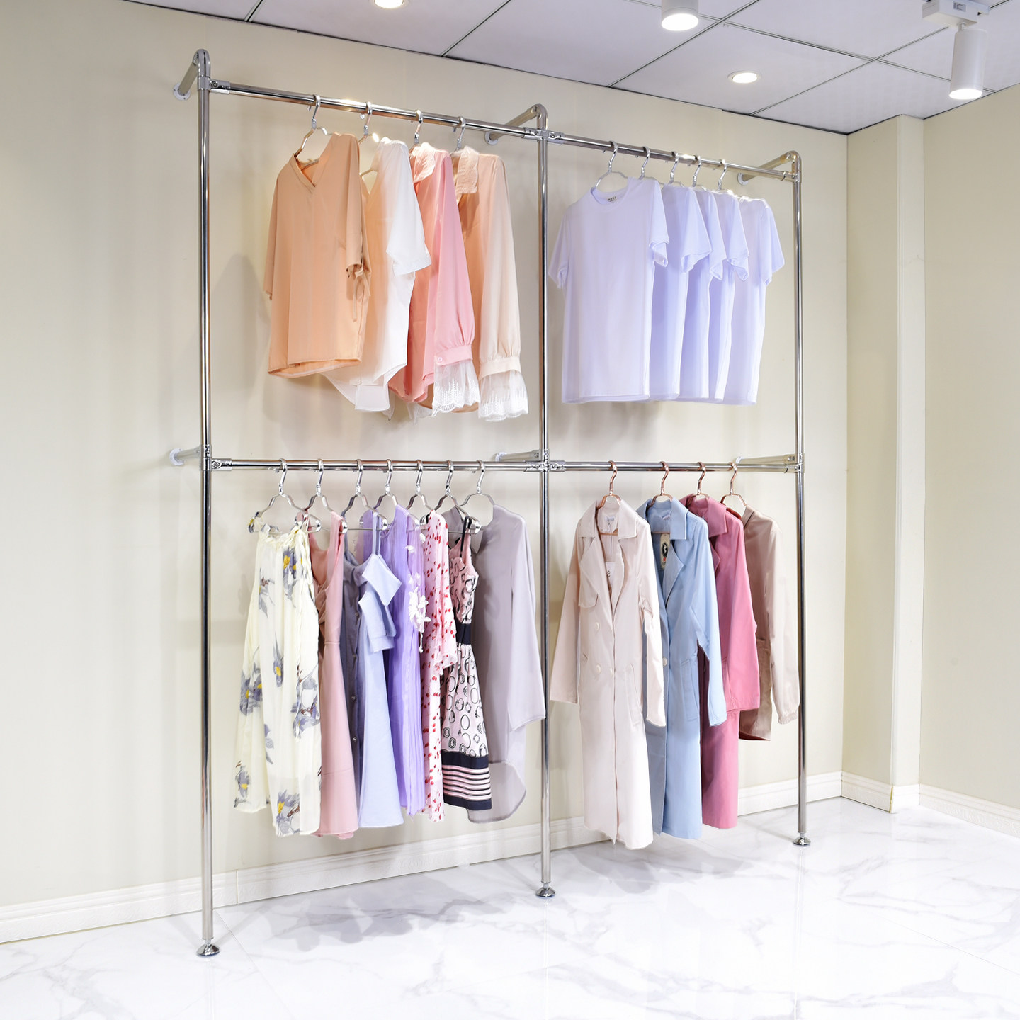 服装墙上展示架不锈钢定制图片