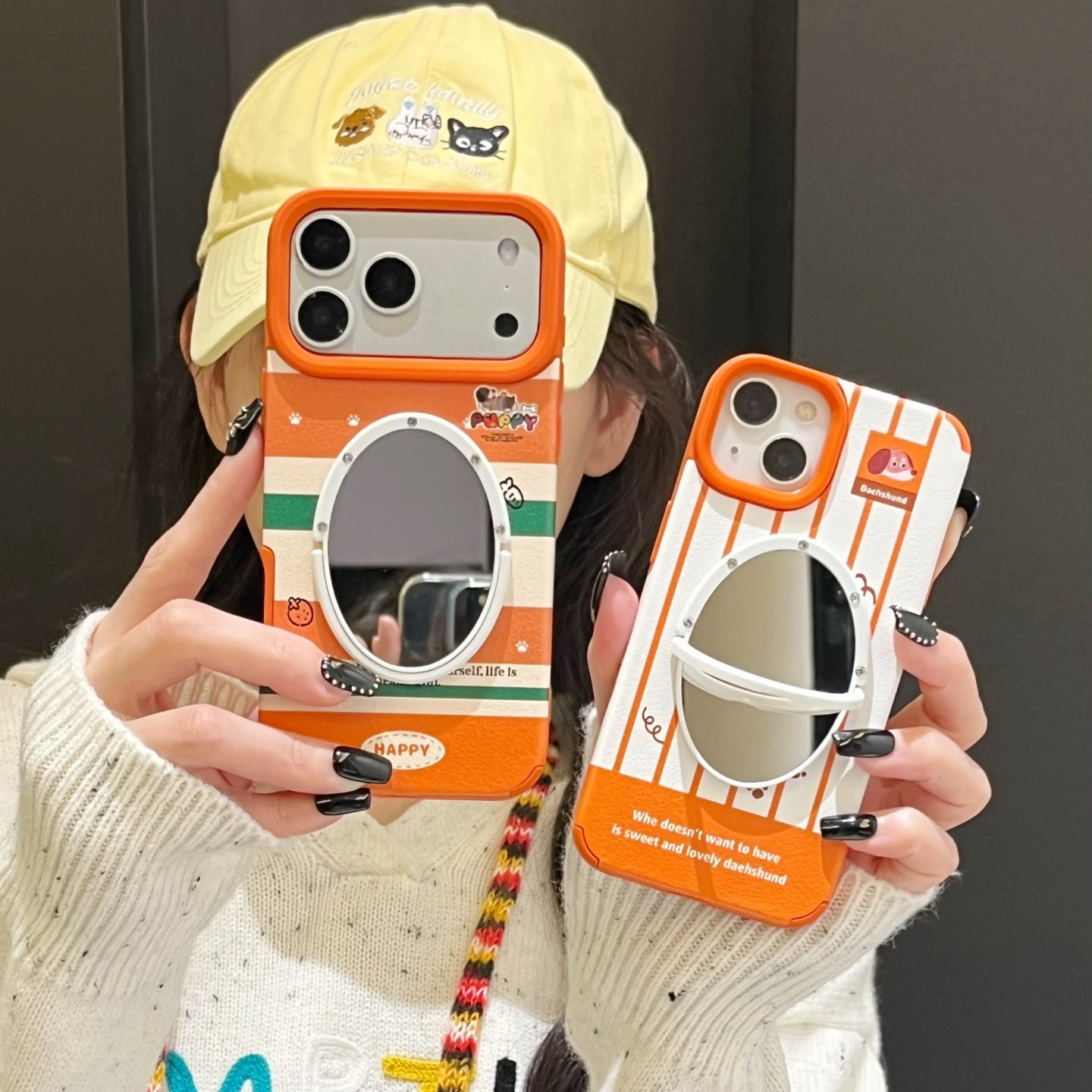 橙色皮质苹果17镜子手机壳小狗