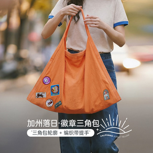 马登落日橘尼龙超大容量通勤电脑手提单肩出行轻托特包三角包女士