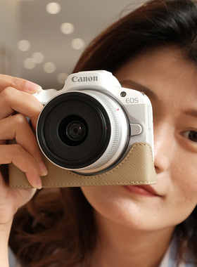 适用佳能R50保护套R50V真皮皮套R100R8RP相机包R10R62V1底座牛皮